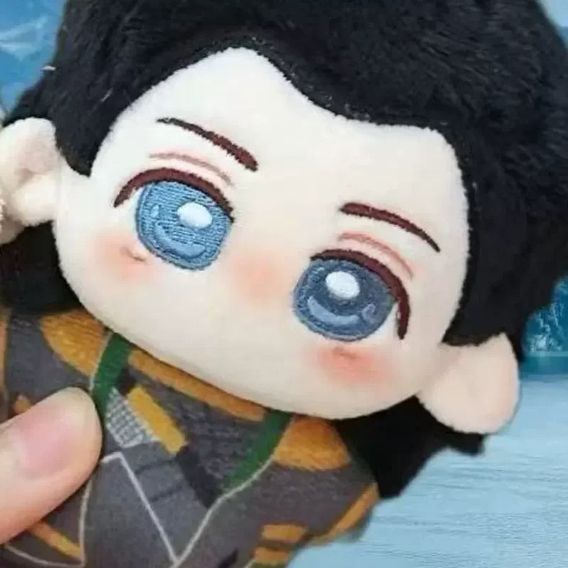 Maekar plush with stern facial expression.