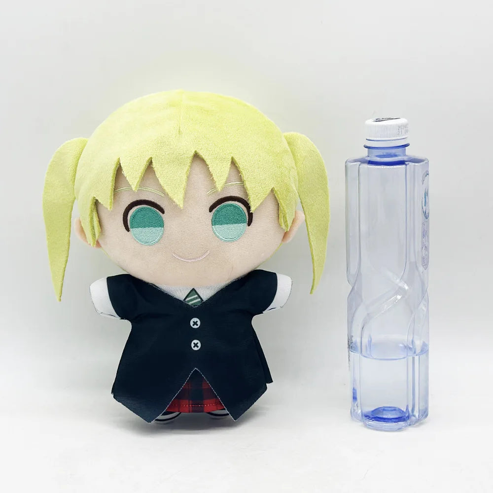 Maka albarn plush doll held in two hands for size reference