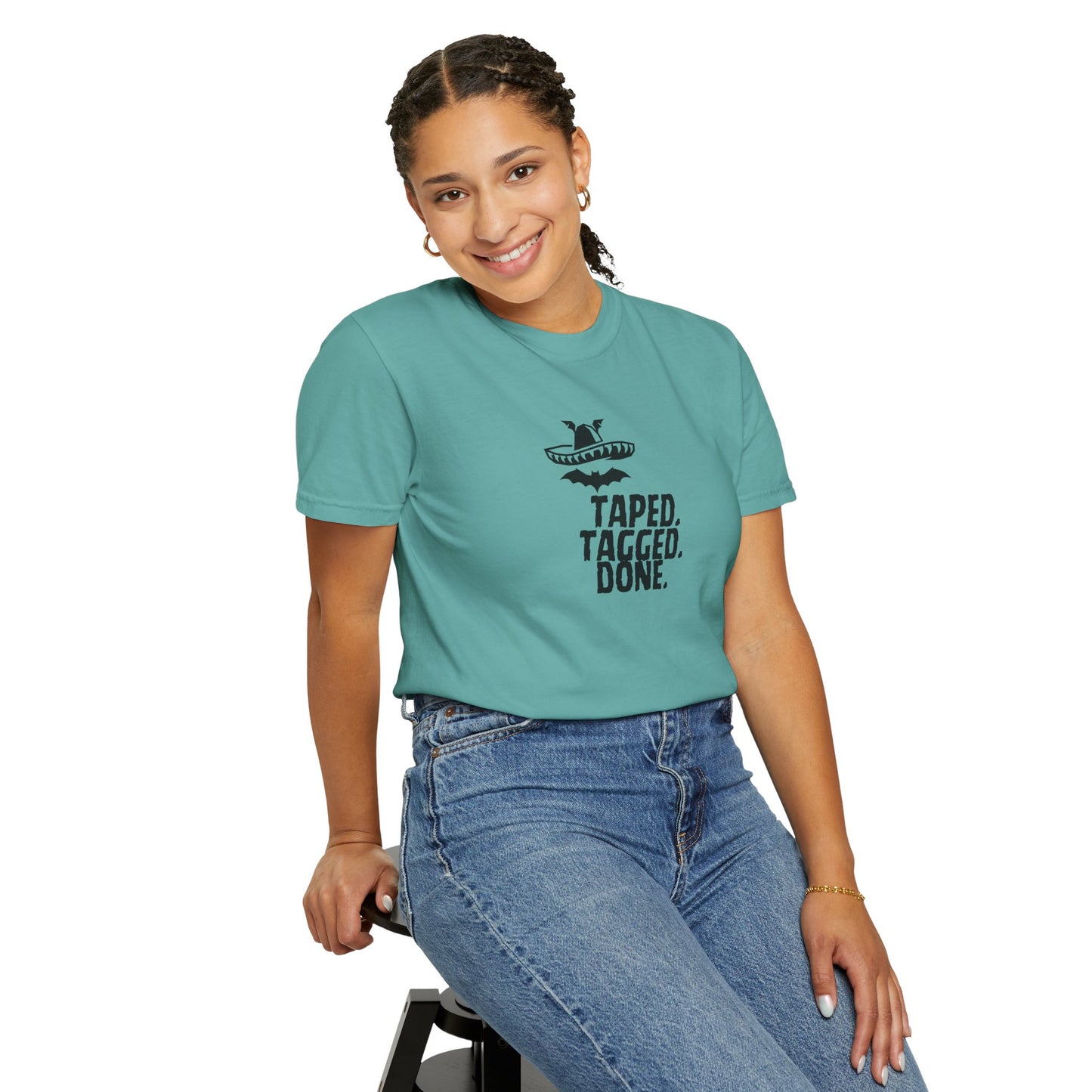 Male model wearing The Midnight Mariachi Taped Tagged Done heavyweight cotton tee with jeans
