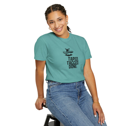 Male model wearing The Midnight Mariachi Taped Tagged Done heavyweight cotton tee with jeans
