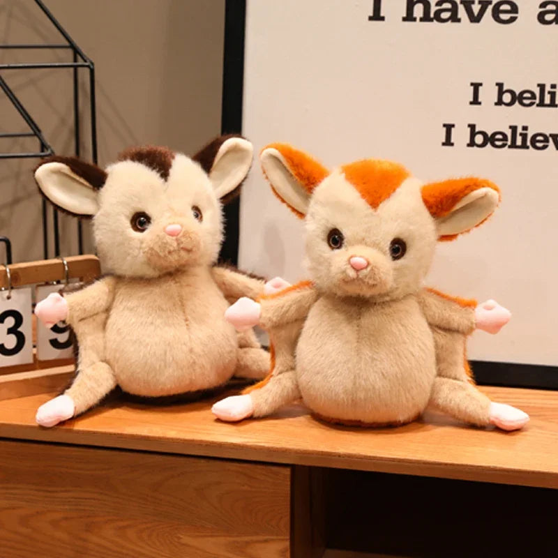 Marsupial plush toy held in open hands showing 25cm size
