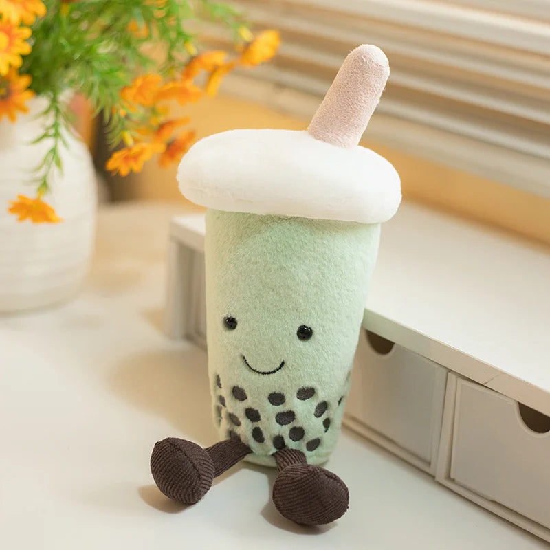 Matcha green tea stuffed toy detail shot showing embroidered smiley face expression