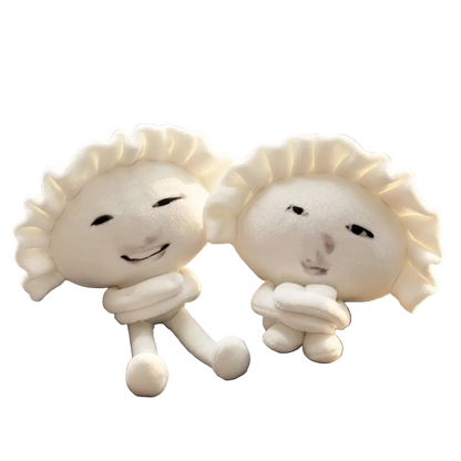 Meme dumpling plush keychain with expressive funny face on white background
