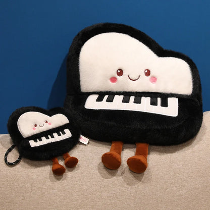 Mini 16 cm piano plushie keychain pendant clipped to a canvas tote bag strap
