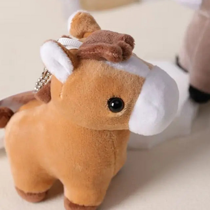 Mini animal plush keychains flat lay all five zoo crew animals