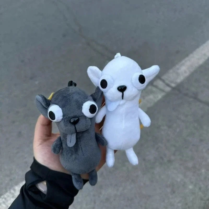 Mini chihuahua plush toy pendant attached to a backpack