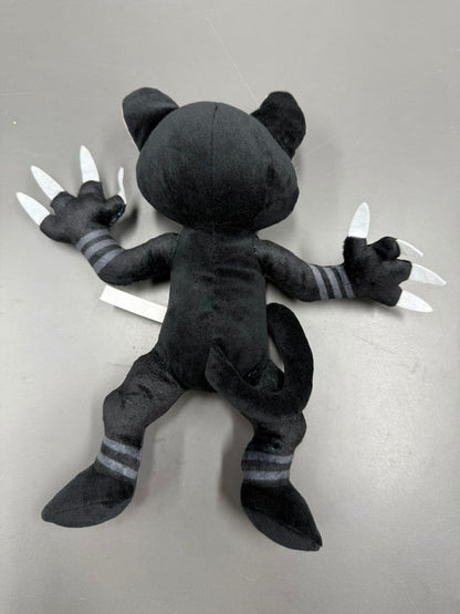 Minimalist black cat stuffed toy with white stitched eyes.