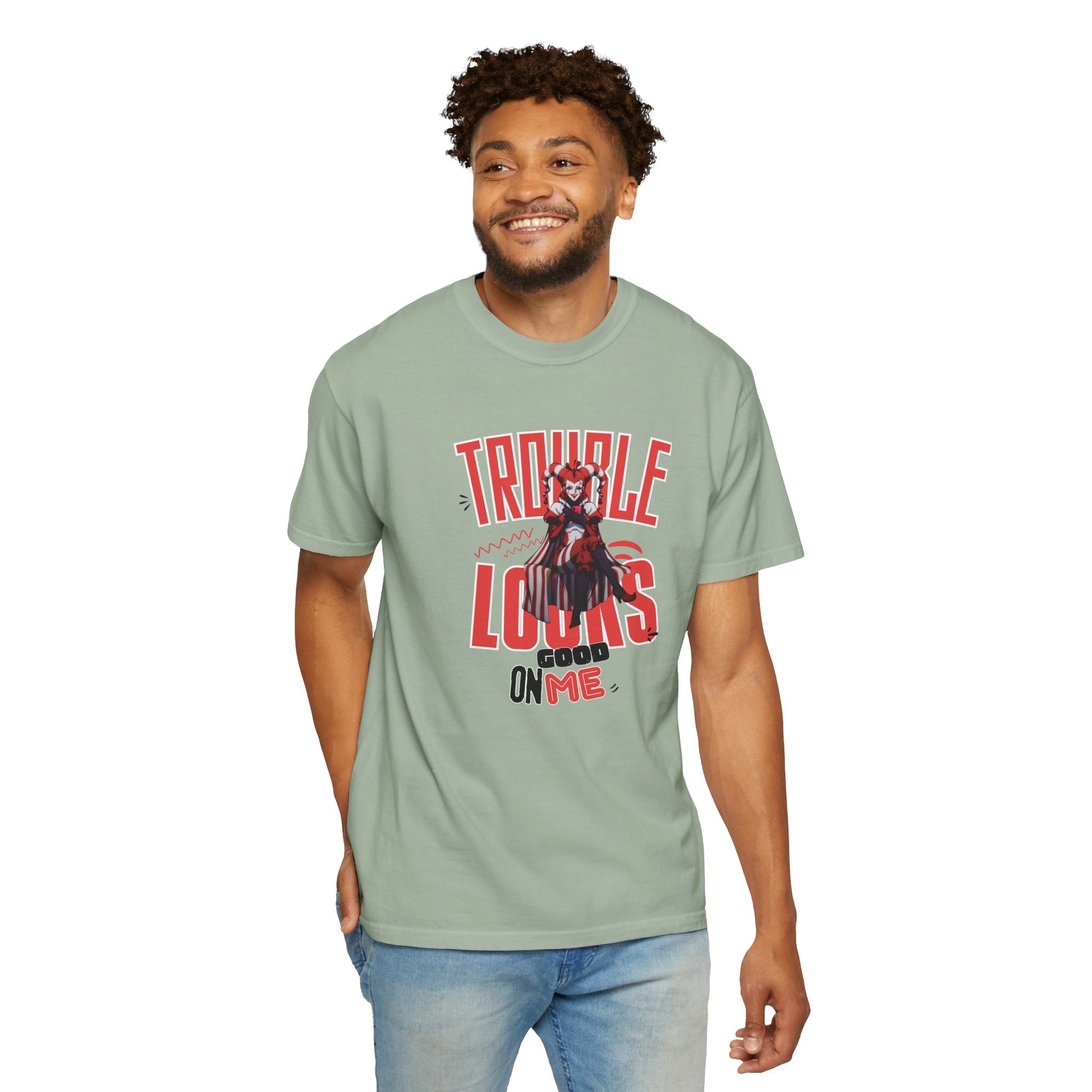 Mischievous character tee product flat lay on black matte surface with minimal props
