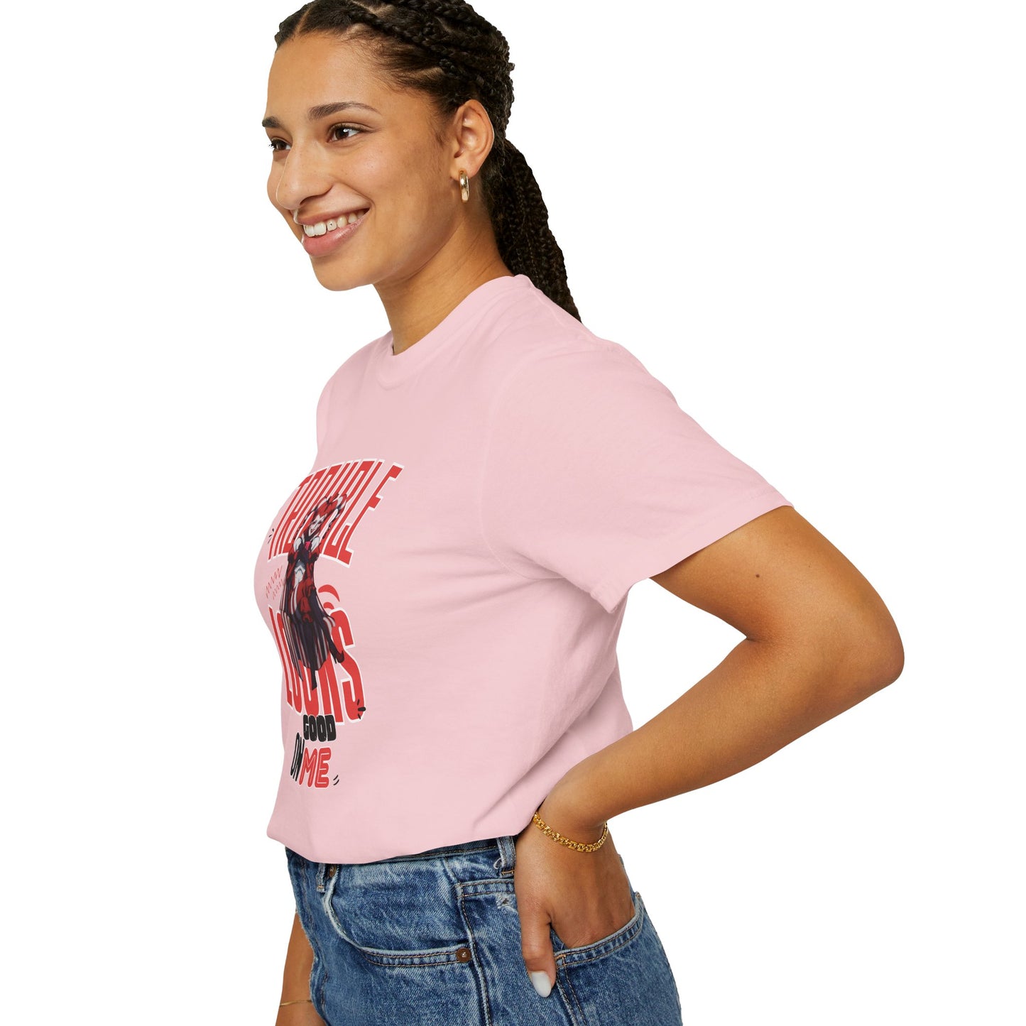 Miss Chiff graphic tee worn by model sitting on steps, relaxed casual pose showing natural garment drape
