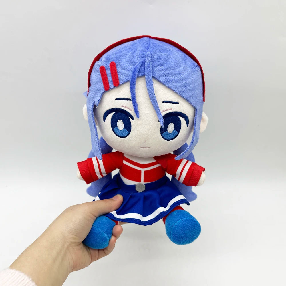 Mita plush doll side profile showing blue skirt and outfit

