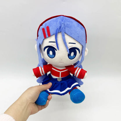 Mita plush doll side profile showing blue skirt and outfit
