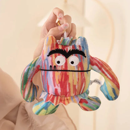 Mixed emotions stuffed animal showing all six emotion colors against a neutral background