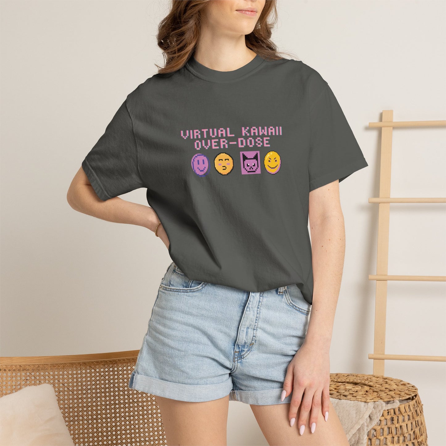 Model wearing oversized kawaii pixel art shirt with pleated skirt and platform boots
