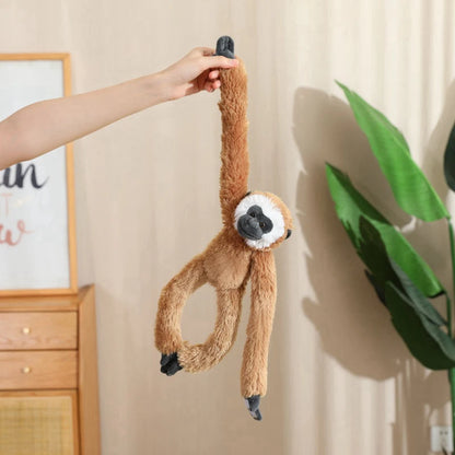 Monkey and sloth plushie collection flat lay showing all size variants 50cm and 70cm