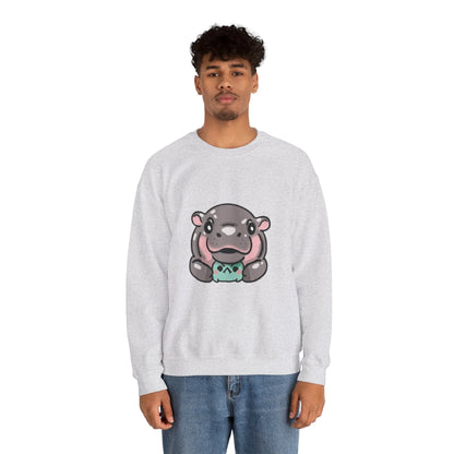 Moo Deng pygmy hippo crewneck sweatshirt draped over chair lifestyle shot
