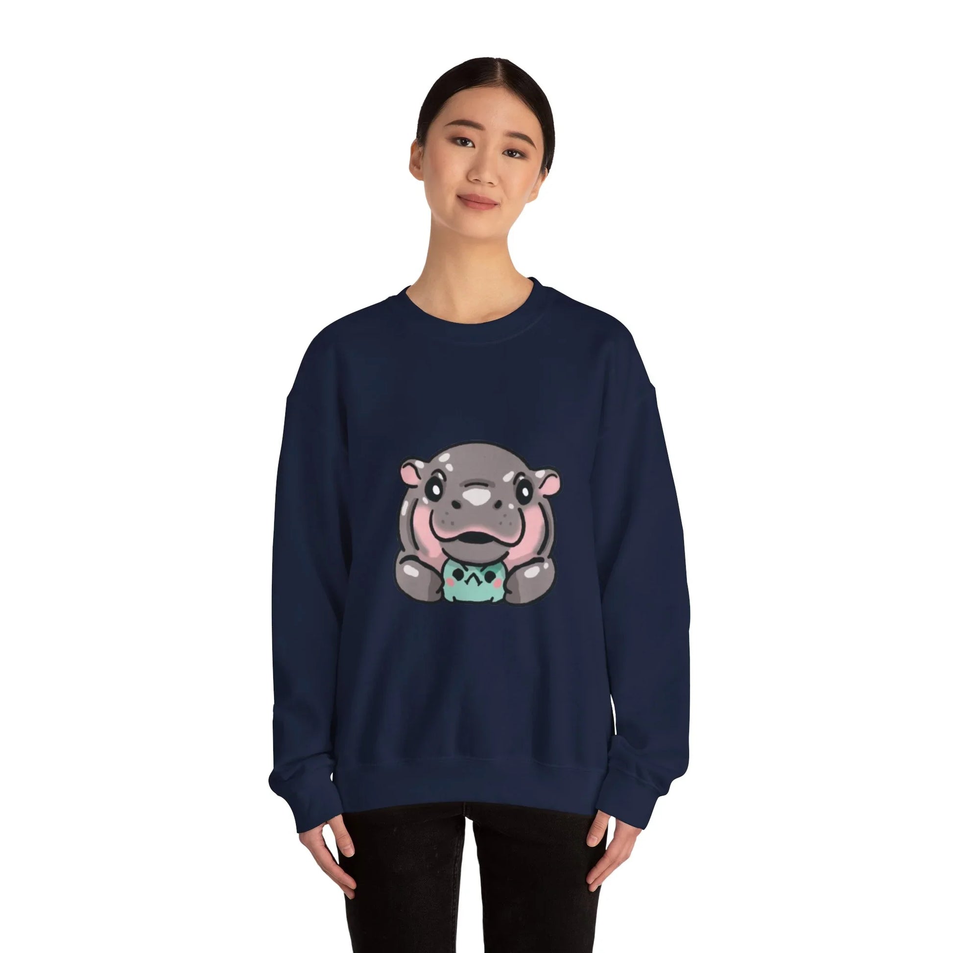 Moo Deng sweatshirt folded to show fabric texture and print quality
