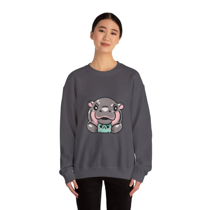 Moo Deng sweatshirt shown against dark background highlighting graphic detail
