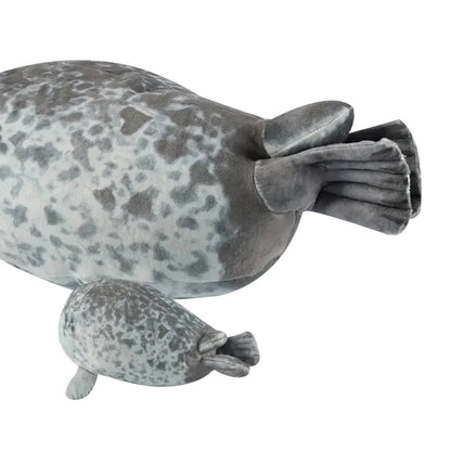 Mother seal plushie unzipped showing four tiny baby seal plushies