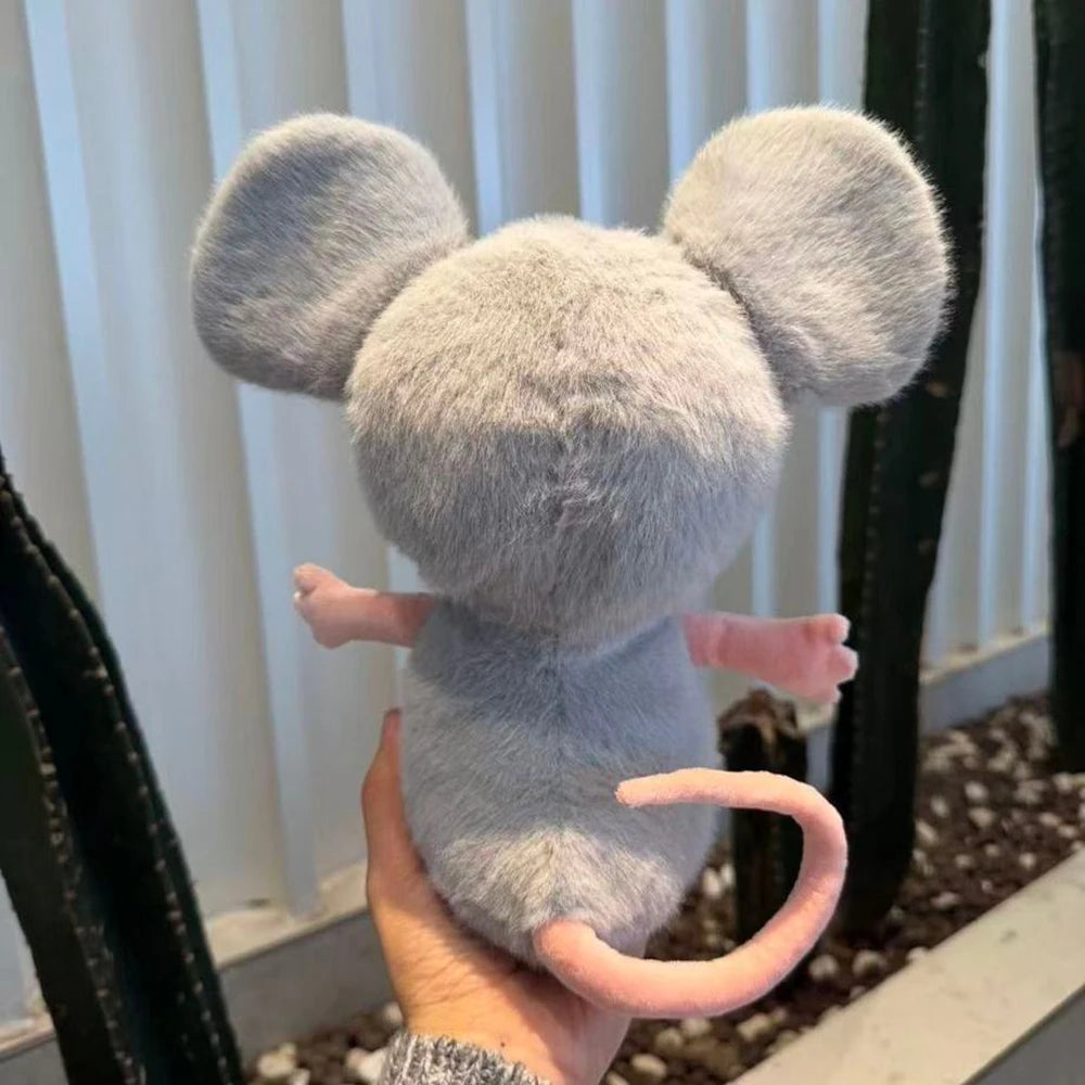 Mouse plush sitting on desk as quirky office companion, meme-inspired novelty plush toy