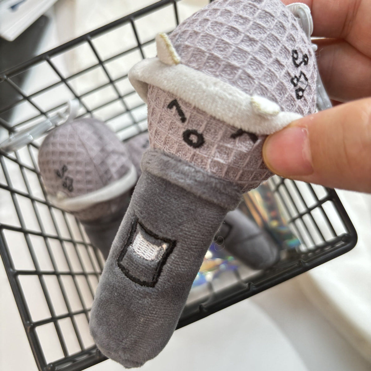 Music plush charm showing full body including metal clip keychain attachment