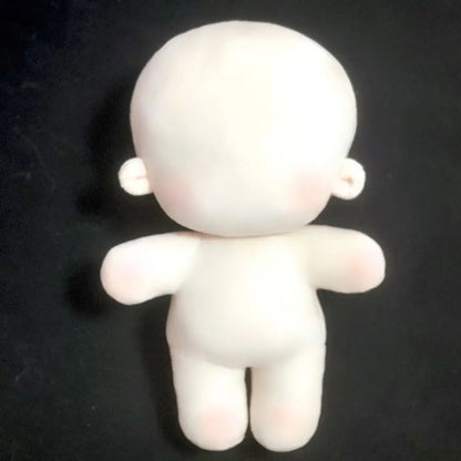 Naked plush doll with embroidered face neutral expression
