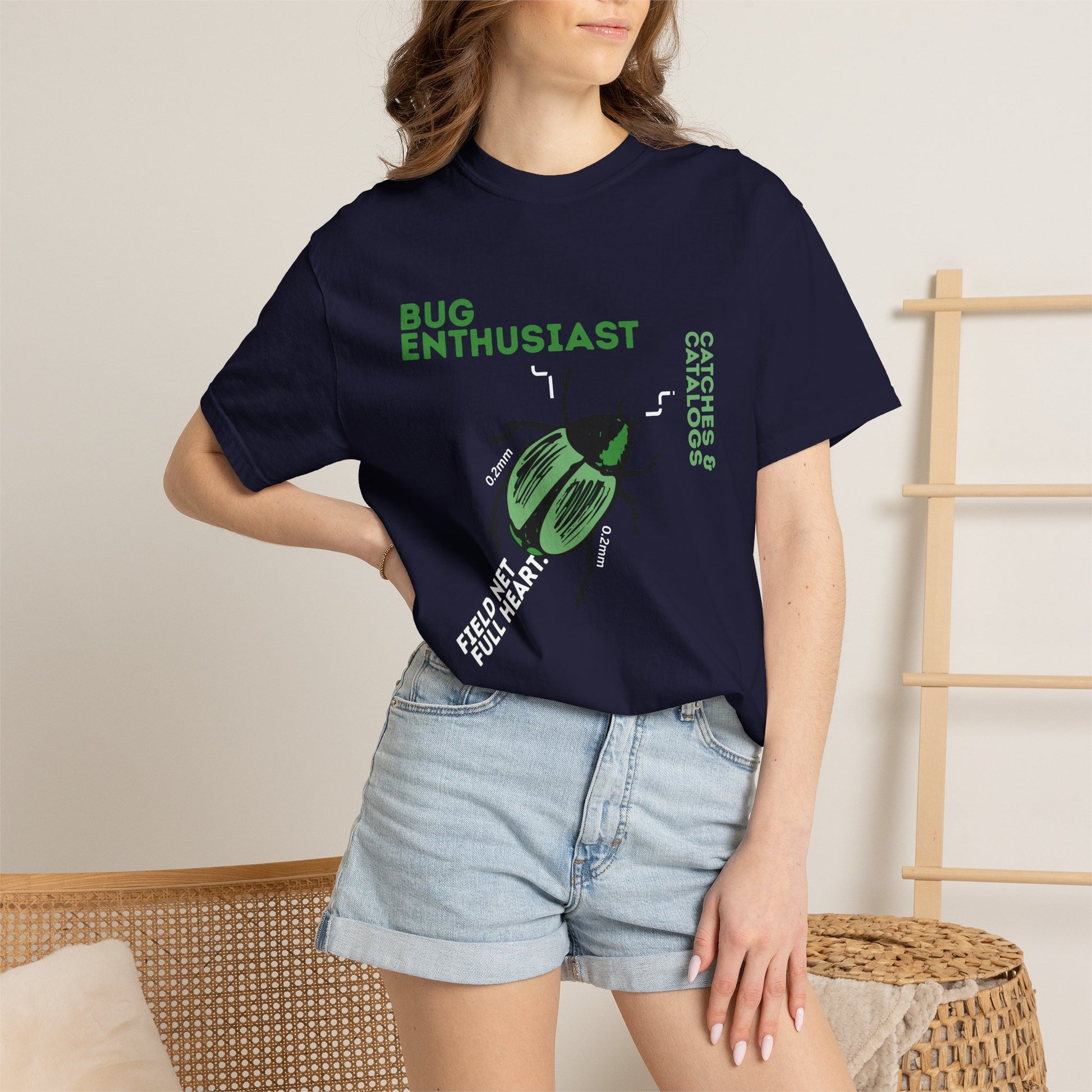 Nature graphic tee with beetle illustration hanging on wall hanger
