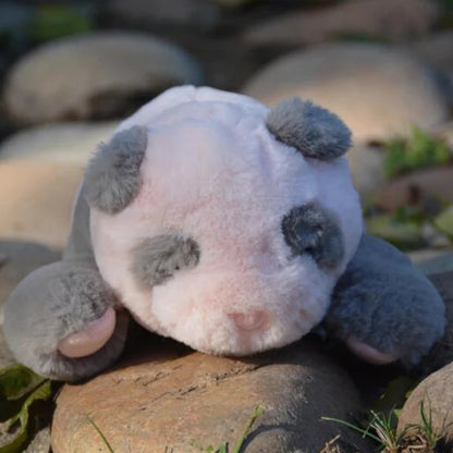 Newborn panda plushie pink skin stage baby panda stuffed animal close-up detail