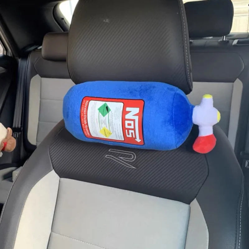 Nitrous plush car decor pillow displayed on car headrest
