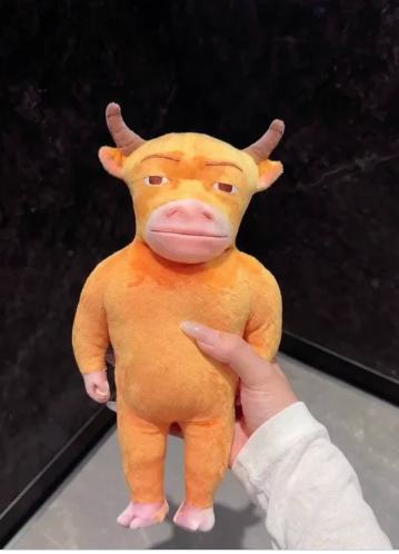 Niu Lai stuffed animal size comparison with hand scale reference