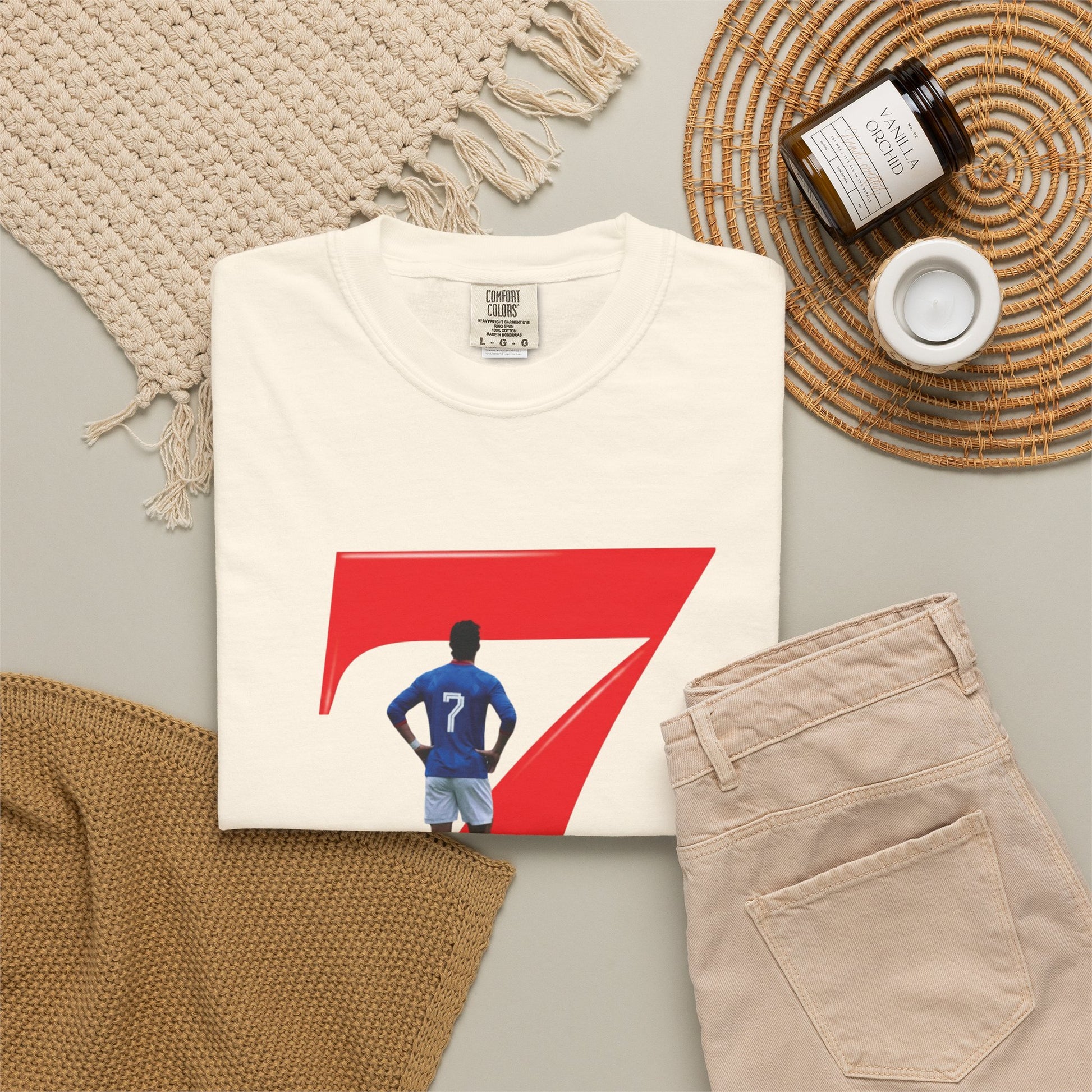No.7 football shirt with lone footballer in wide-stance celebration