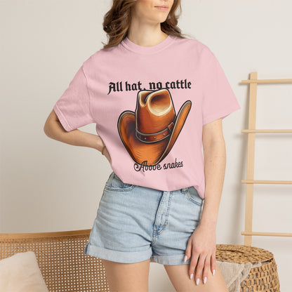 No cattle tees on model seated on hay bales outdoors
