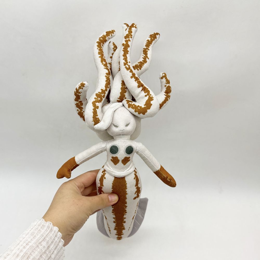 Ocean monster plush doll with creepy-cute face and tentacle crown