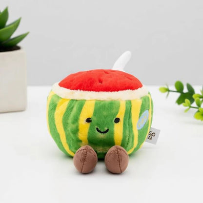 Orange cartoon fruit plushie sitting on nursery shelf cute stuffed animal