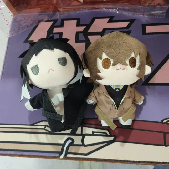 Osamu Dazai plushies side view showing bandage detail and coat design
