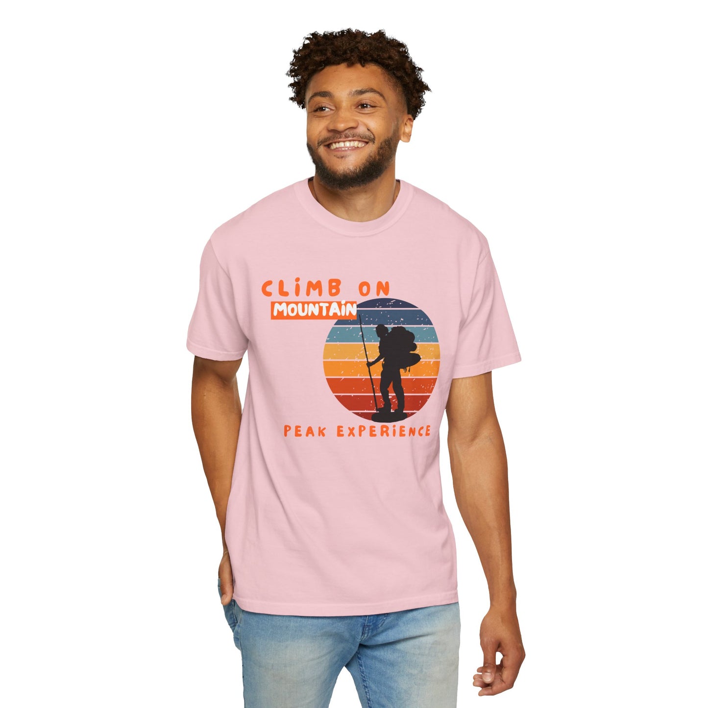 Outdoor adventure tee gift idea with climber silhouette and Peak Experience typography on pigment-dyed fabric