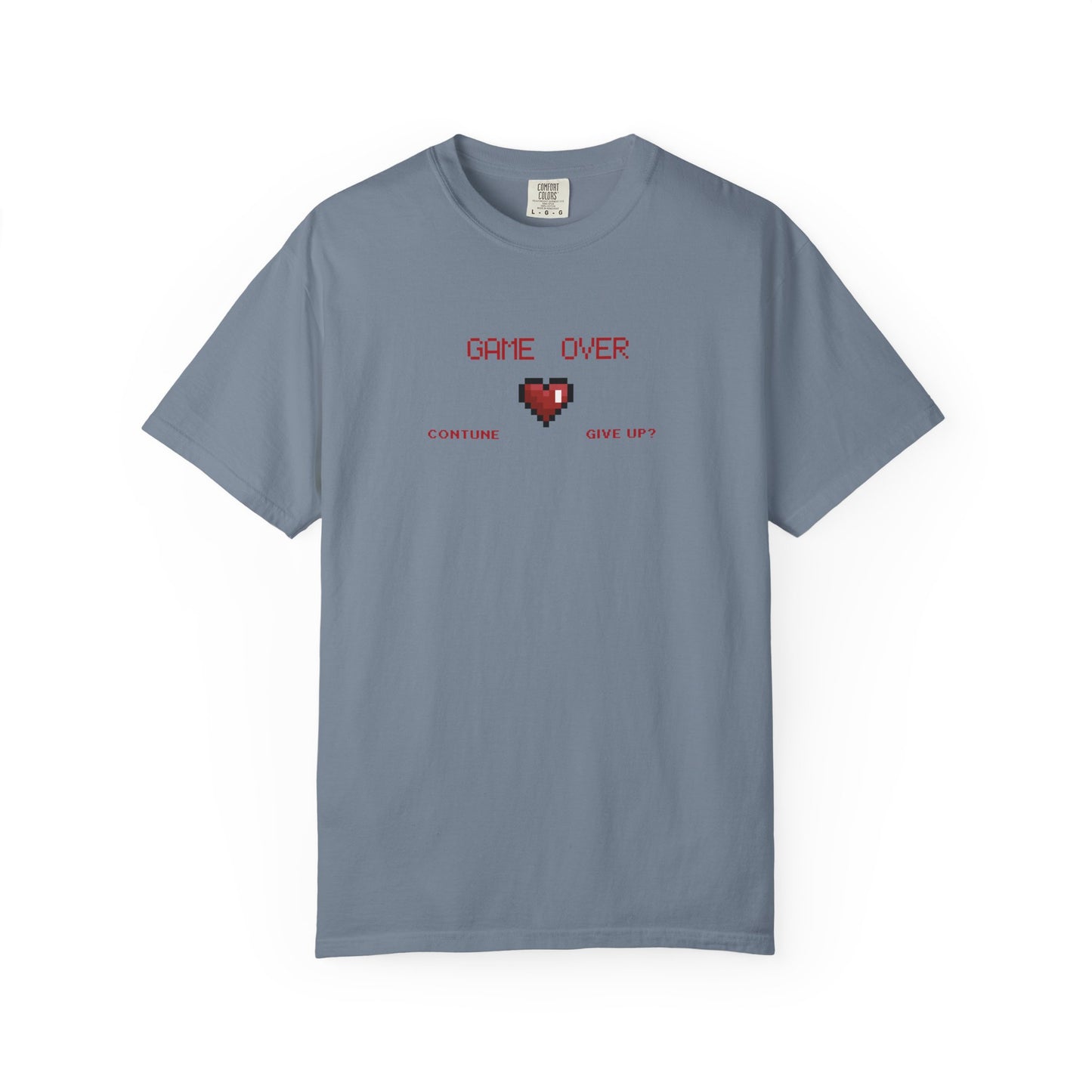 Overhead folded flat lay of game over shirt showing soft garment dyed fabric and collar detail in natural light
