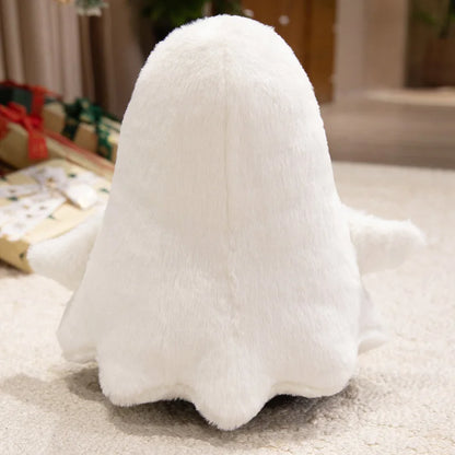 Pastel Halloween ghost plush in a cozy bedroom styling shot