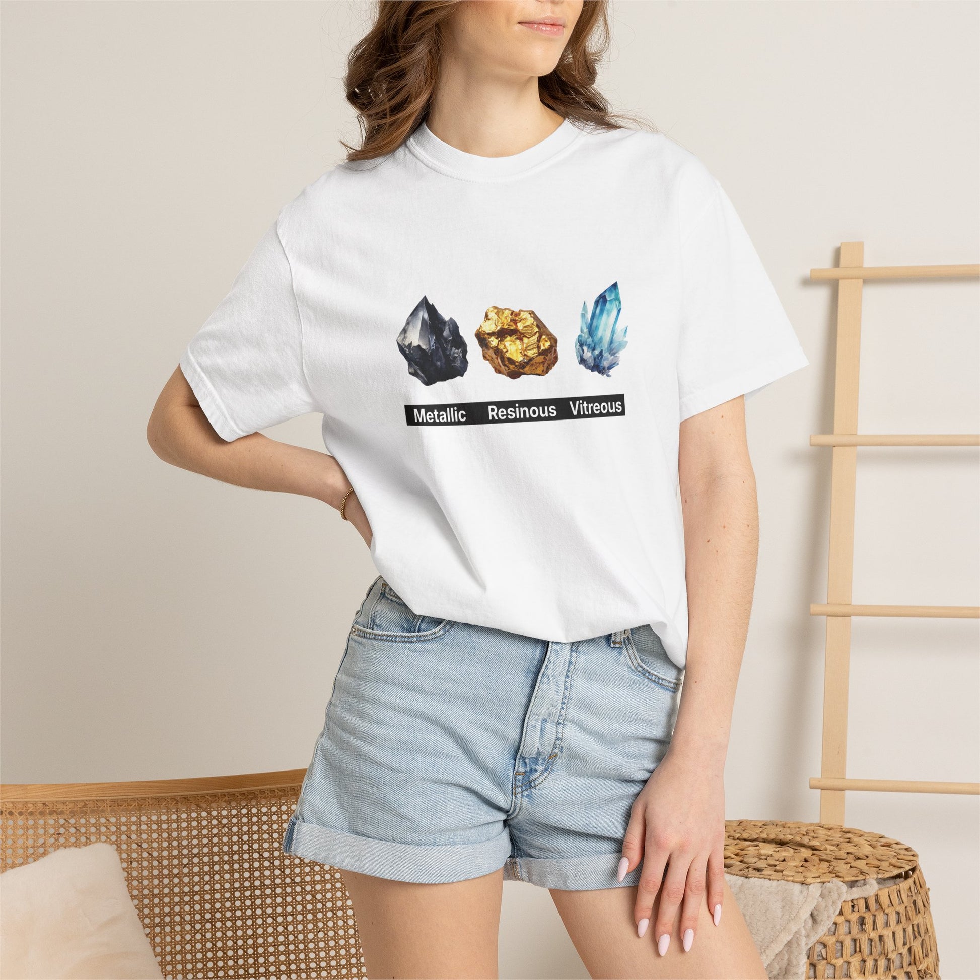 Person wearing crystal luster graphic tee while rockhounding outdoors