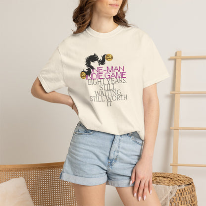 Pink 8-bit graphic tee typography reading One-Man Indie Game up close
