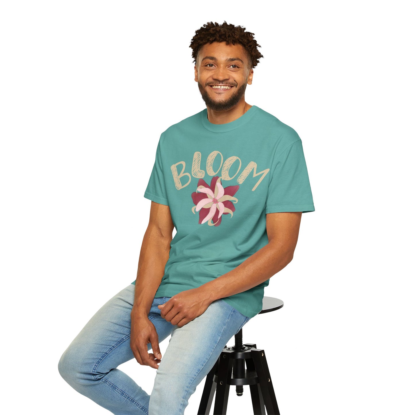 Pink blossom graphic tee collar and shoulder detail showing sewn-in label and stitching quality