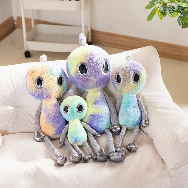 Pink cosmic galaxy plushie displayed on bedroom shelf as aesthetic room decor