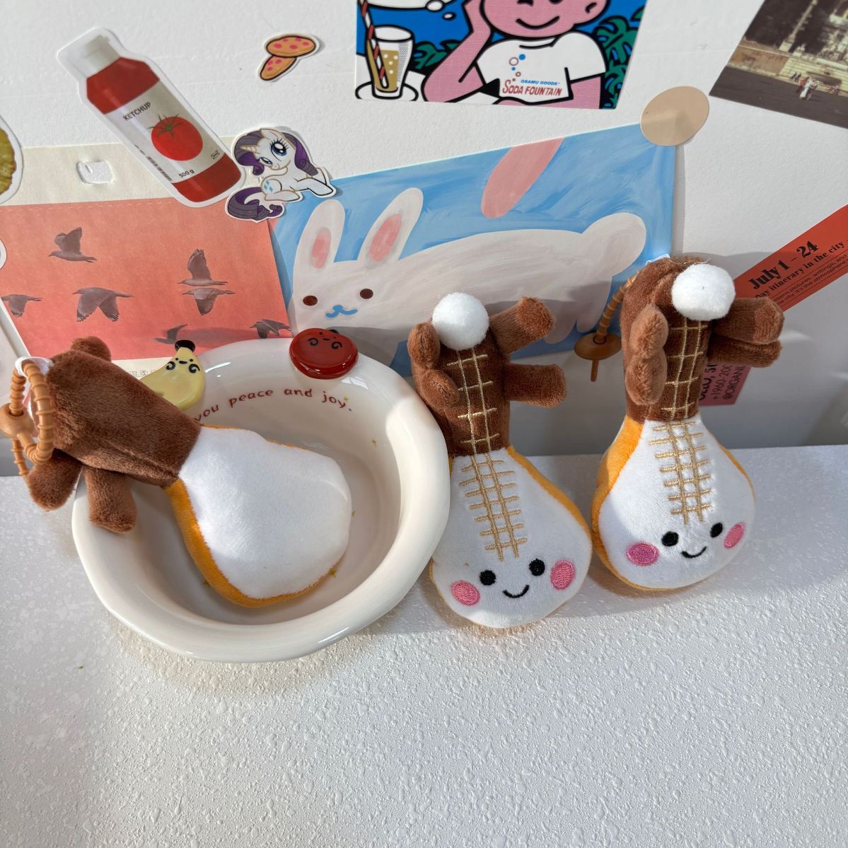 Pipa lute plushie pastel background flat lay product photography