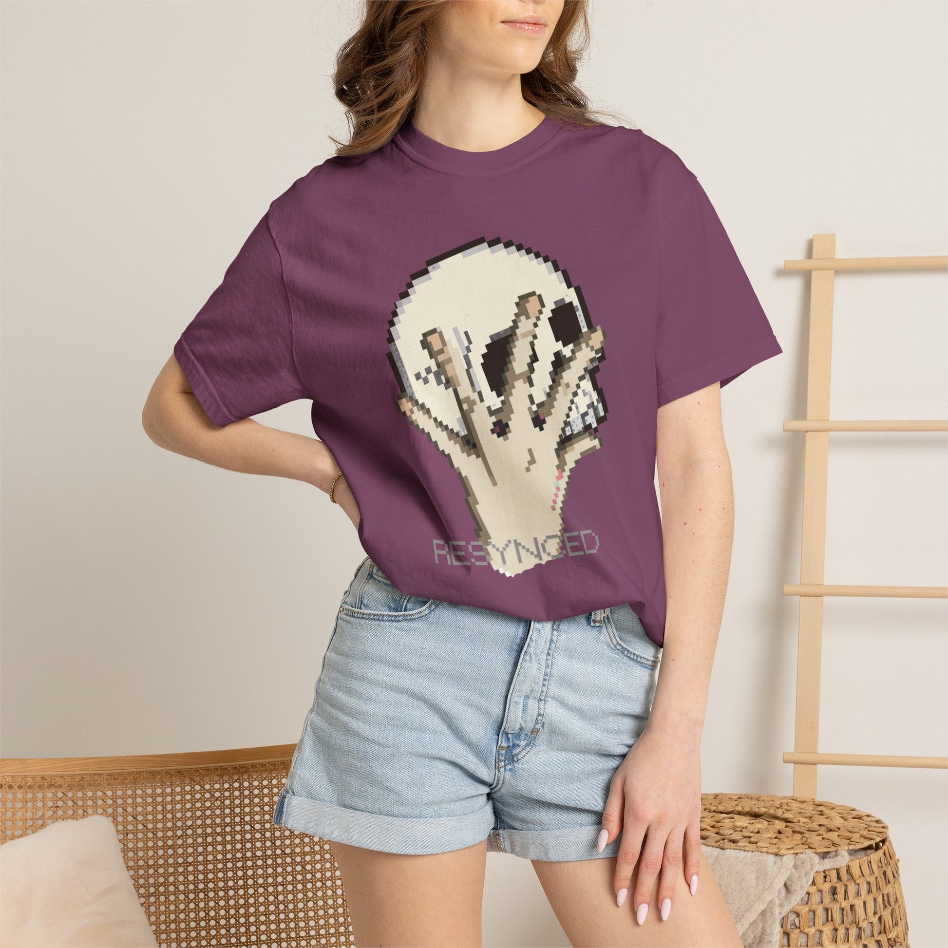 Pixel art skull shirt sci-fi lettering detail close-up grey tone

