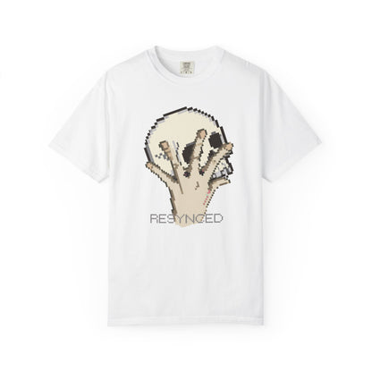 Pixel hand tee with melting fragmented skull in cream and grey pixel art
