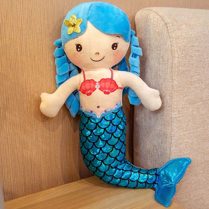 Plush mermaid doll back view showing yarn hair length and tail detail