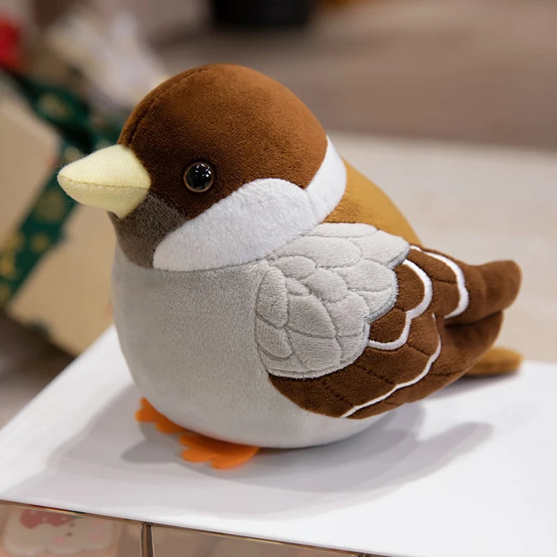 Plush sparrow toy displayed in flat lay photography aesthetic setup
