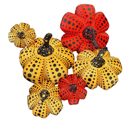 Polka dot pumpkin plush in 20cm size displayed on a white shelf