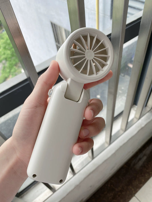 Portable handheld cooling fan with TEC semiconductor cooling element and LED digital display