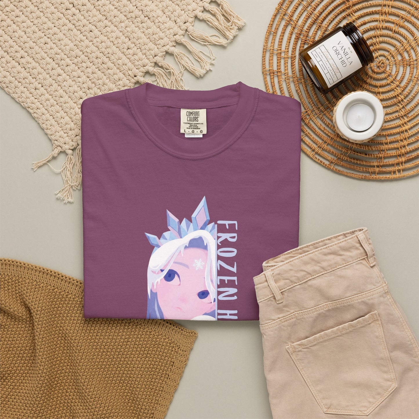 Premium heavyweight cotton tee featuring ice-blue cryo empress gaze and frozen heart typography art
