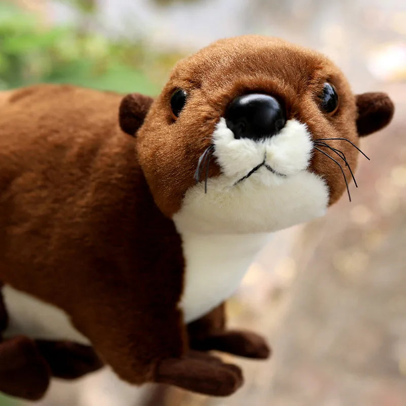 Realistic brown river otter plush wildlife collectible side profile